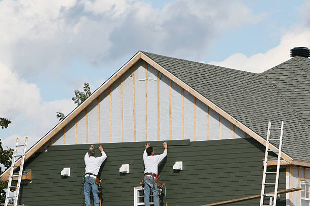 Professional Siding Contractor technician working in Biscoe, NC